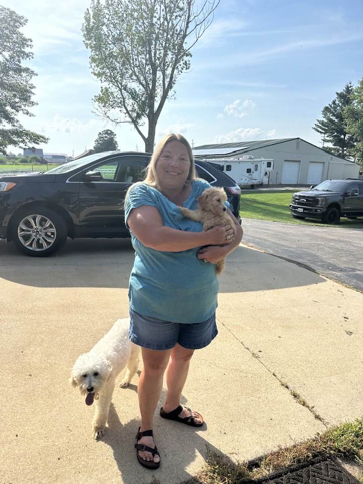 Happy family with their new puppy